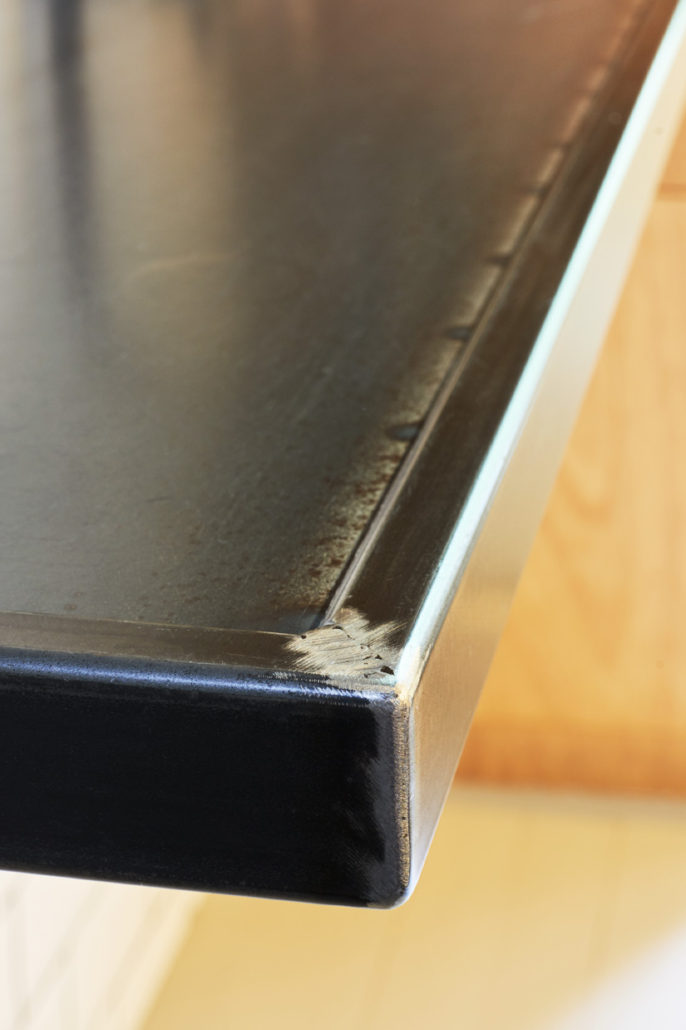 Steel Countertop Hot Rolled Staall The Oak Wood Drawer Fronts Have Hot Rolled Steel Handles This Kitchen Is Executed With A Built In Oven And Gas Cooktop